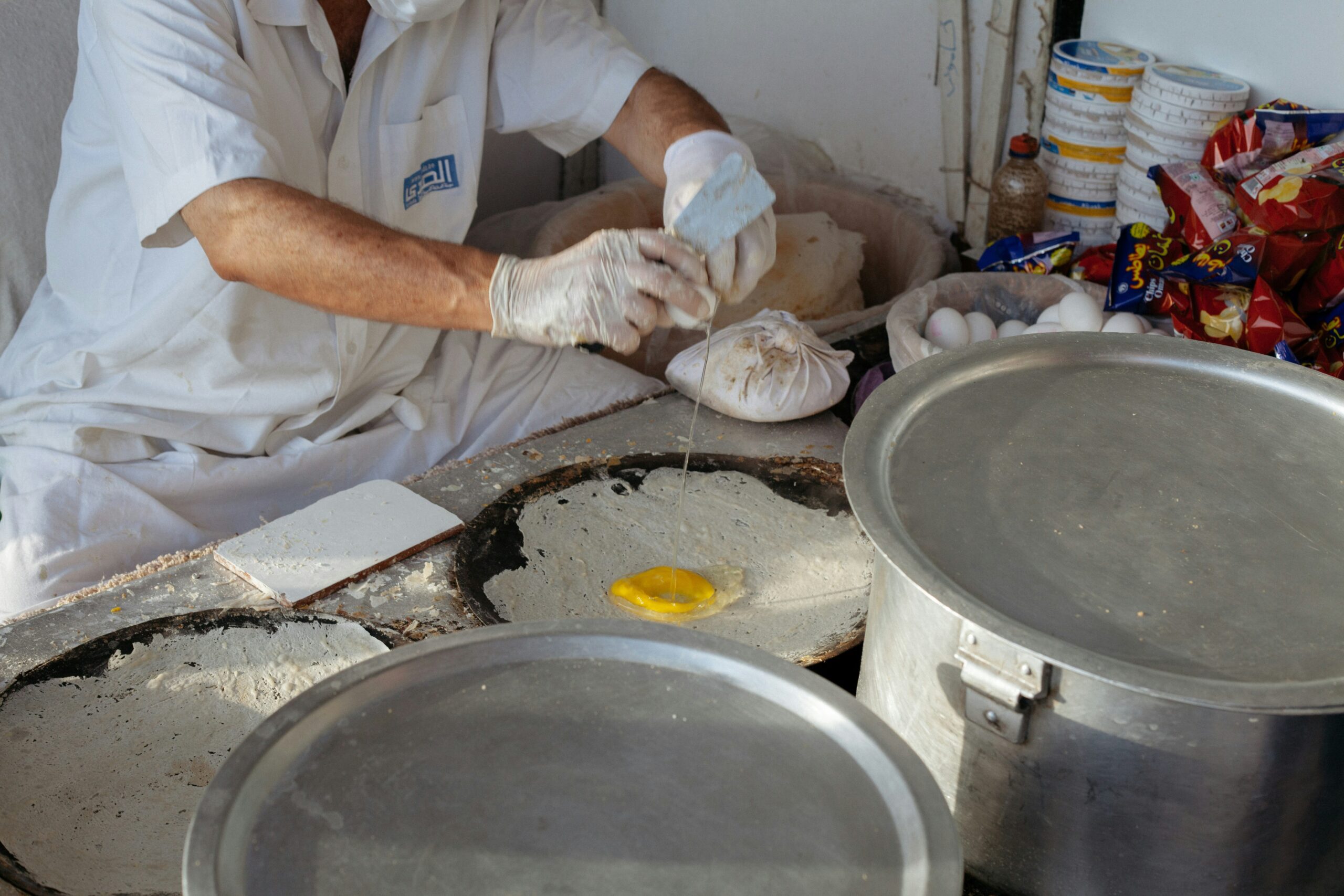 Turmeric powder being measured for use