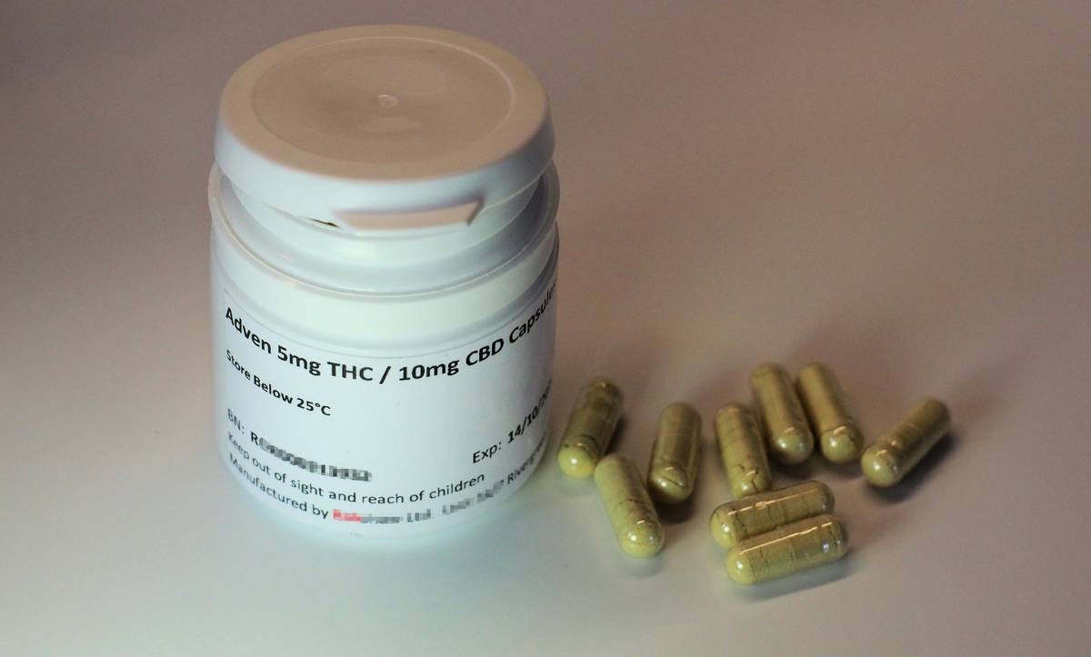 Closeup shot of turmeric pet supplement packaging showing ingredient list